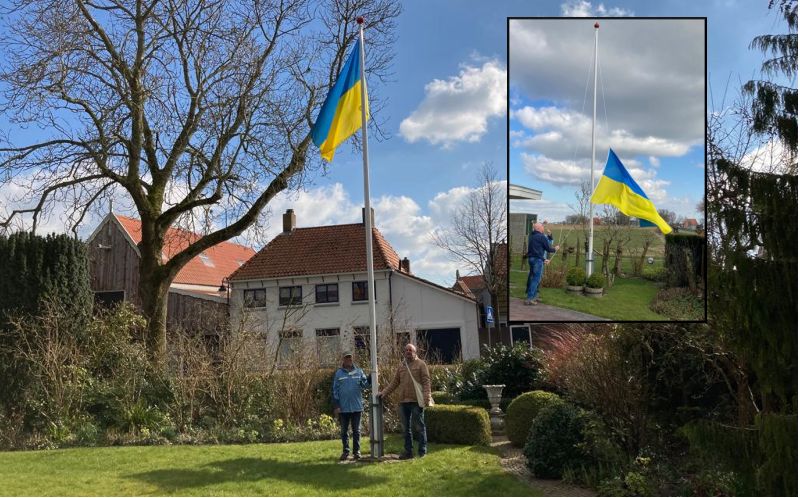 Feddie Bouma en Jan Volbeda hebben de vlag gehesen in de tuin van 